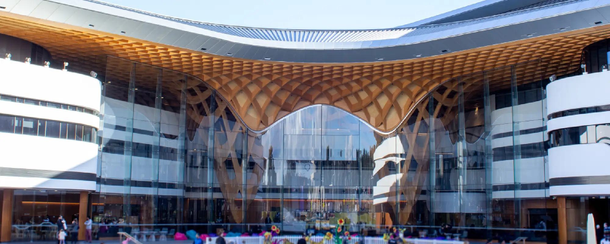 Exterior view of a building with a mass timber glulam entrance